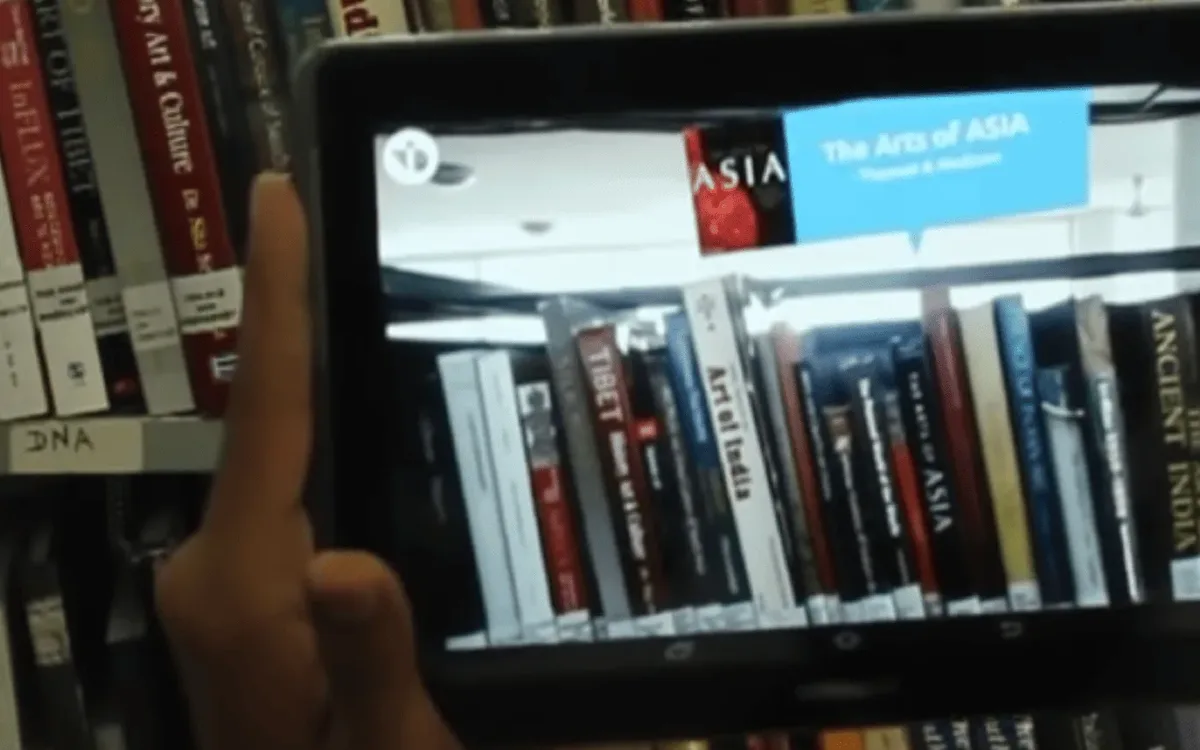 libARi running on a tablet, pointing out a book on a library shelf